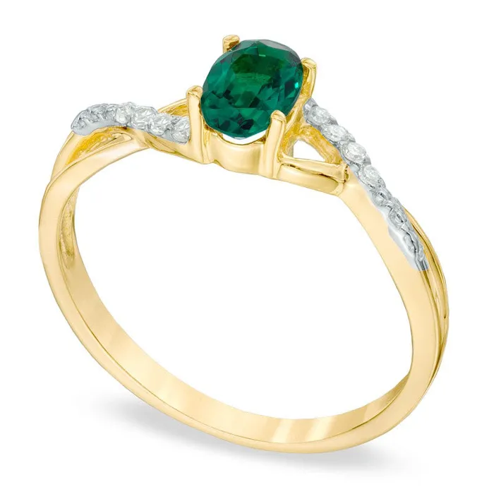 Oval LabCreated Emerald and Diamond Accent Twist Engagement Ring in Solid 10K Yellow Gold Goldia Rings Oval LabCreated Emerald and Diamond Accent Twist Engagement Ring in Solid 10K Yellow Gold Goldia Rings