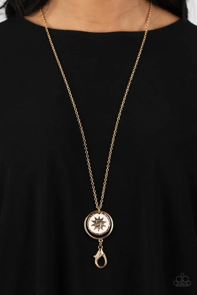 Paparazzi Accessories Cretian Crest Gold Lanyard Necklace Jewelry by Bretta Necklaces Paparazzi Accessories Cretian Crest Gold Lanyard Necklace Jewelry by Bretta Necklaces