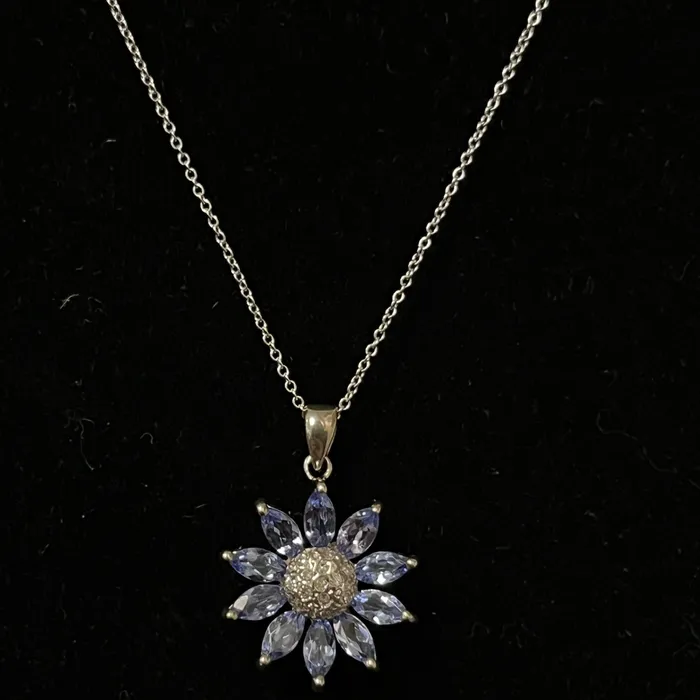Crown Jewels Coin Necklaces 499 14 Karat Diamond and Tanzanite Flower Pendant Crown Jewels Coin Necklaces 499 14 Karat Diamond and Tanzanite Flower Pendant