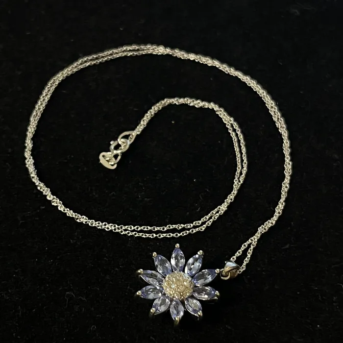 Crown Jewels Coin Necklaces 499 14 Karat Diamond and Tanzanite Flower Pendant